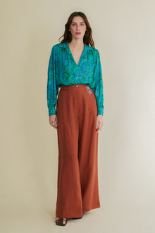 Adelfa turquoise loose v-neck blouse